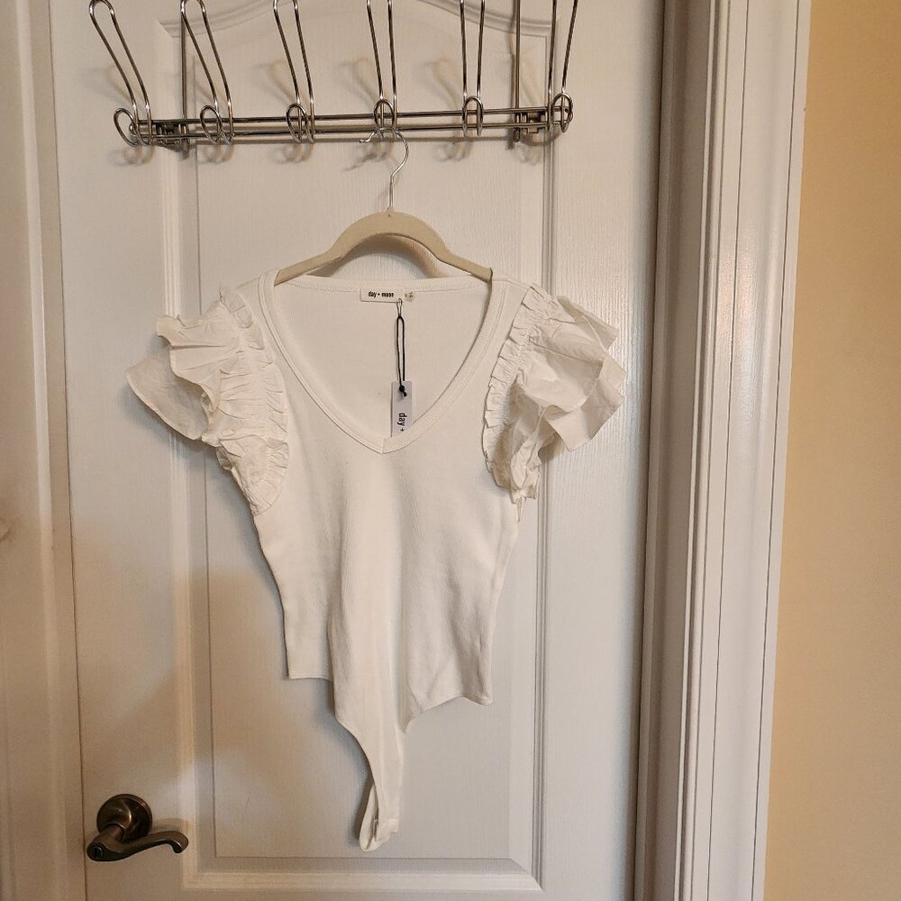 Size Small NWT white body suit with ruffle sleeves